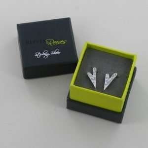 A wonderful pair of sterling silver long hammered heart stud earrings.