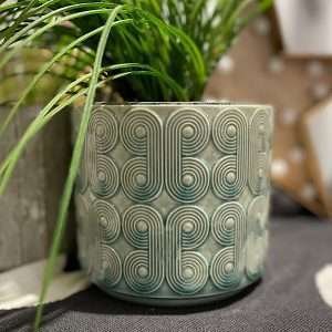 A light blue coloured retro design planter which is available in two different sizes.