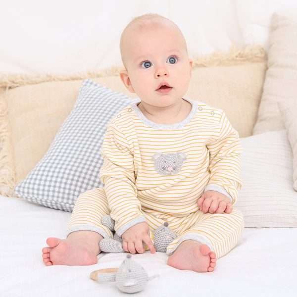 A yellow and white striped baby grow with a crochet mouse motif