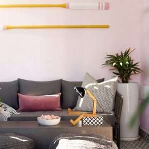 A fun wooden hand made lamp. Made from ash wood with moveable joints and with a vespa style headlamp fixing.