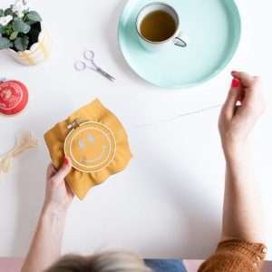 A sweet embroidery kit with a wooden embroidery hoop frame. The kit comes in mustard or navy and has step by step instructions on how to create this lovely wall hanging.