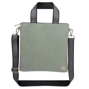 A lovely large crossbody bag made from green vegan leather and with a detachable strap as well as a short handle.