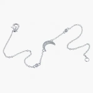 A fine sterling silver chain bracelet with a moon and star, both embellished with a pave stone finish,