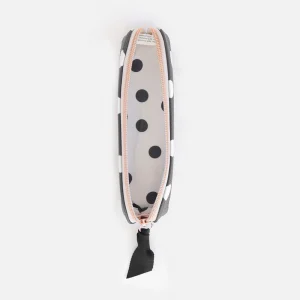 Charcoal Spot Pencil Case. A charcoal grey pencil case with white spots, a contrasting spotty lining and rose gold zip fastening with black grosgrain ribbon zip pull