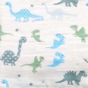 A box set of three muslins in blue colours. One has blue and grey stripes, one with blue tractors and another with blue and grey dinosaurs