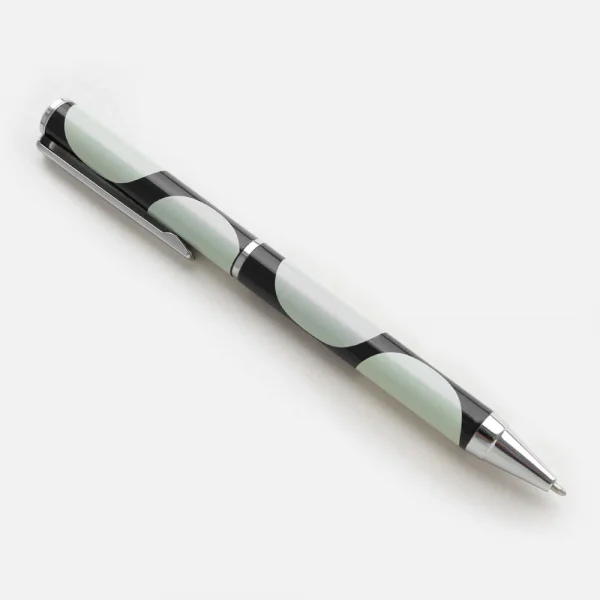 Charcoal spot boxed pen. A black and white spotty ballpoint pen