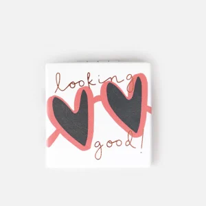 Heart Sunglasses Pocket Mirror. A square pocket mirror with a pair of red heart sunglasses and the caption looking good