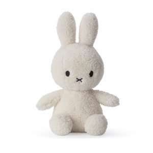A gorgeous cream coloured terry miffy bunny. With cute ears and paws and with black eyes and criss cross nose.