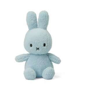 A gorgeous light blue coloured terry miffy bunny. With cute ears and paws and with black eyes and criss cross nose.