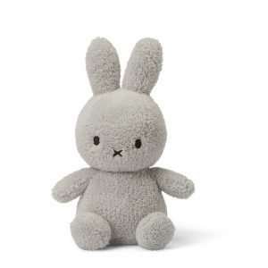 A gorgeous light grey coloured terry miffy bunny. With cute ears and paws and with black eyes and criss cross nose.