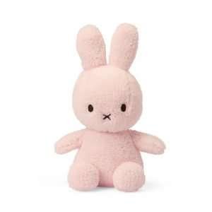 A gorgeous light pink coloured terry miffy bunny. With cute ears and paws and with black eyes and criss cross nose.