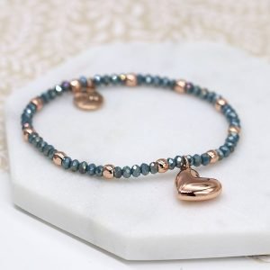 Rose gold round bead and blue faceted bead bracelet with a rose gold style heart charm