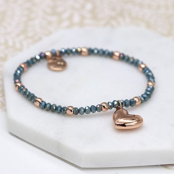 Rose gold round bead and blue faceted bead bracelet with a rose gold style heart charm