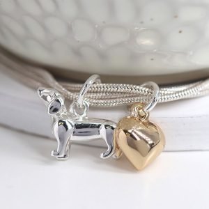 Silver plated triple strand snake chain bracelet with a golden heart charm and silver plated dachshund