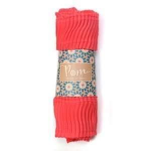 Coral Lightweight Crinkle Scarf. Lightweight scarf in coral pink with a fine pleated texture and lightly frayed ends.