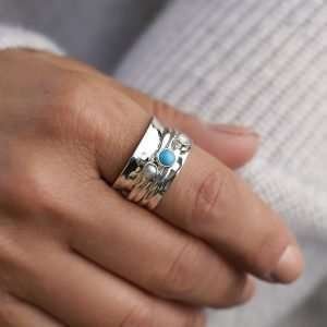 Sterling silver spinning ring with a hammered band, Pearl, Moonstone and Turquoise gemstones