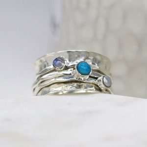 Sterling silver spinning ring with a hammered band, Pearl, Moonstone and Turquoise gemstones