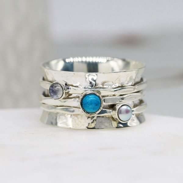 Sterling silver spinning ring with a hammered band, Pearl, Moonstone and Turquoise gemstones