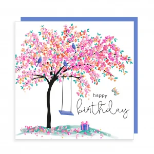 A lovely cherry Blossom Birthday card with a design with a swing hanging from a blossom tree