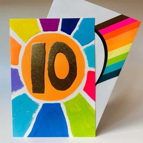 Bright 10th birthday card. Bright colours and a big neon orange circle with a gold foil 10