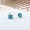 Sterling silver stud earrings set with aqua blue crystals