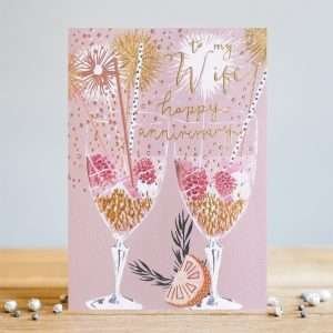 A wife anniversary card with two glasses and sparkle design