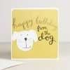 A birthday card with a cute dog and happy birthday from the dog