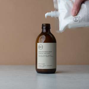 A lovely bottle of patchouli and black pepper body lotion from Bath House. In a brown apothecary bottle with a white pump dispenser and white label