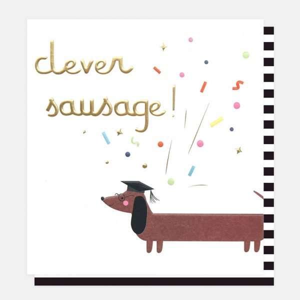 A graduation card from Caroline Gardner with a sausage dog in a mortar board hat and clever sausage in gold foil lettering