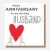 An anniversary card for your husband with a big red heart