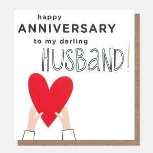 An anniversary card for your husband with a big red heart