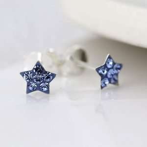 Sterling silver star stud earrings inset with sapphire blue tiny crystals.