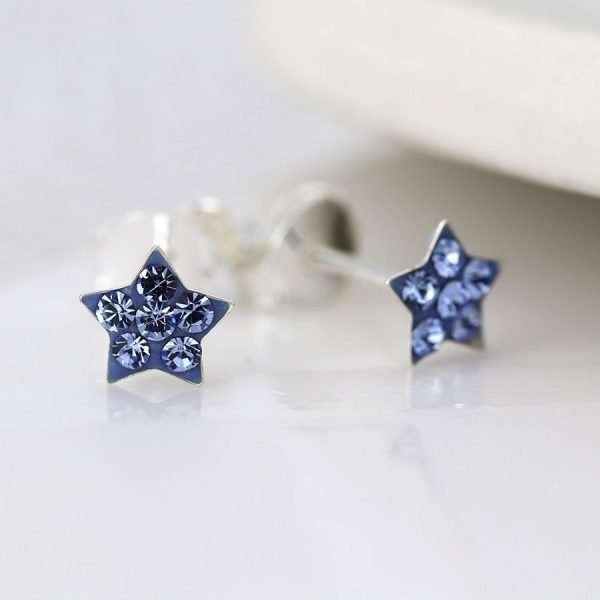 Sterling silver star stud earrings inset with sapphire blue tiny crystals.