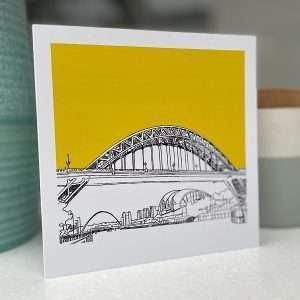 A lovely colourful card with yellow background and a pen and ink drawing of The Tyne Brdge