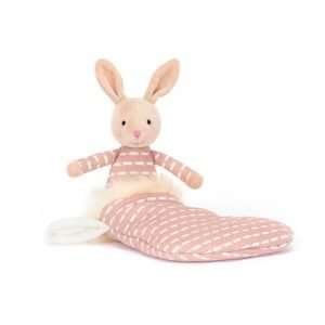 a cute little cuddly bunny in a pink jump0er tucked into a pink shimmery stocking
