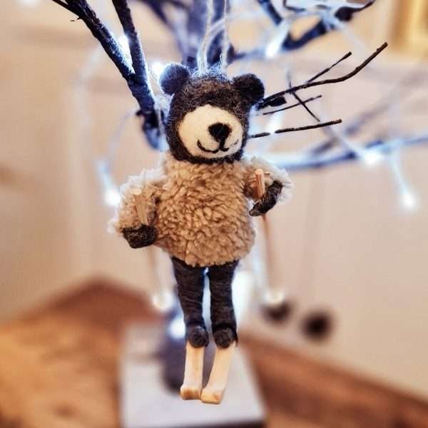 A skiing bear in a fluffy fleece