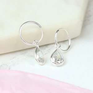 Sterling silver sleeper hoop earrings with faceted CZ crystal teardrops in silver settings