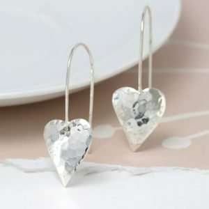 Sterling silver concave heart drop earrings with a hammered texture on long sterling silver hooks