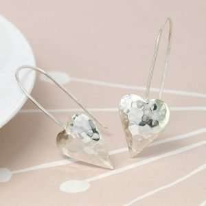 Sterling silver concave heart drop earrings with a hammered texture on long sterling silver hooks