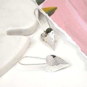 Sterling silver concave heart drop earrings with a hammered texture on long sterling silver hooks