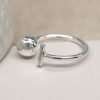 Sterling silver open band ring with a contemporary bar and ball design