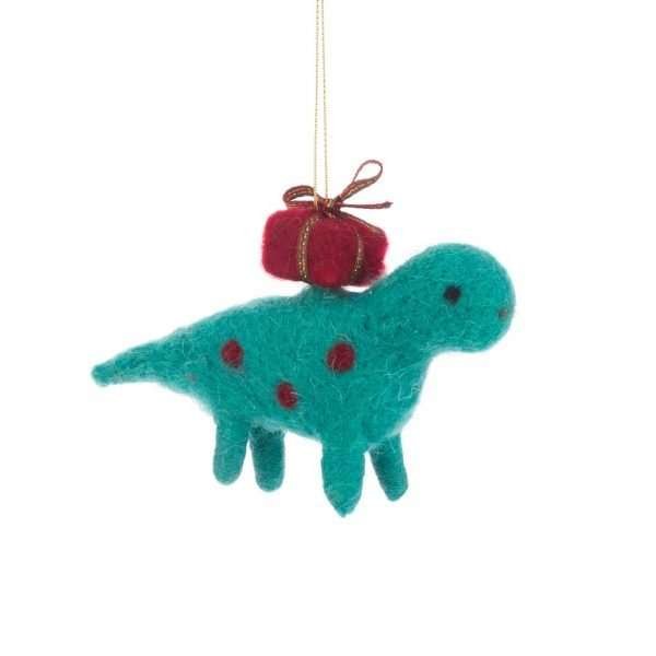 A cute blue felt dinosaur with red spots and a present on its back