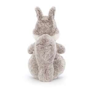 A cuddly speckled pebble grey squirrel from Jellycat With a fluffly white tum and bushy tail
