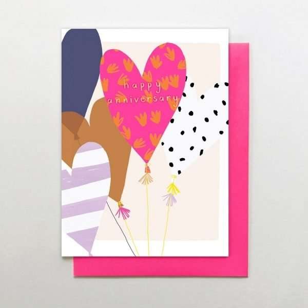 A contemporary anniversary card with heart shaped balloons