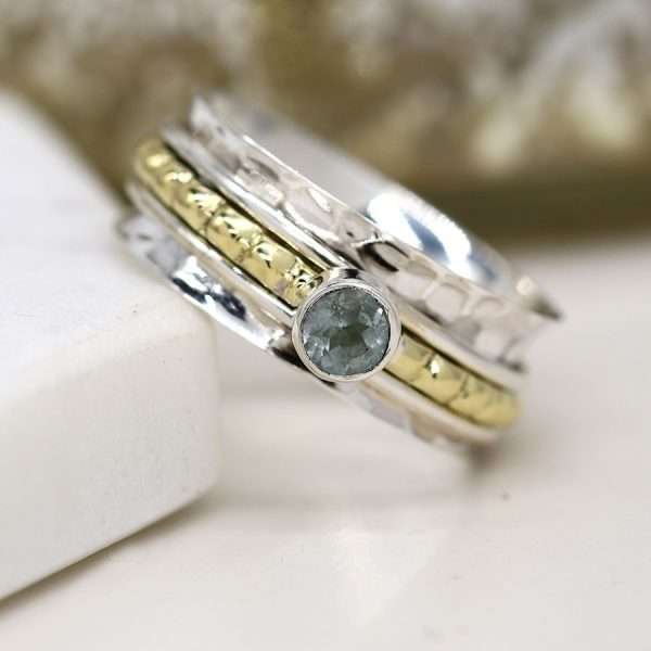 Sterling Silver Spinning Ring with Cut Blue Topaz