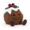 Jellycat Amuseable Christmas Pudding cuddly toy. a soft round pudding with a smiley face little legs