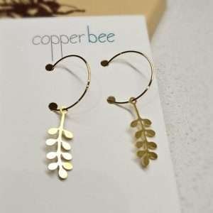 Brass sprig motifs hung on gold plated hoops