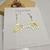 Dangle earrings with brass dandelion seed heads