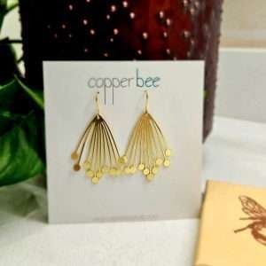 Large seed head motifs in brass on gold plated hooks