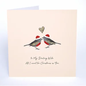A lovely darling wife robins card with a sparky image of two robins wearing santa hats